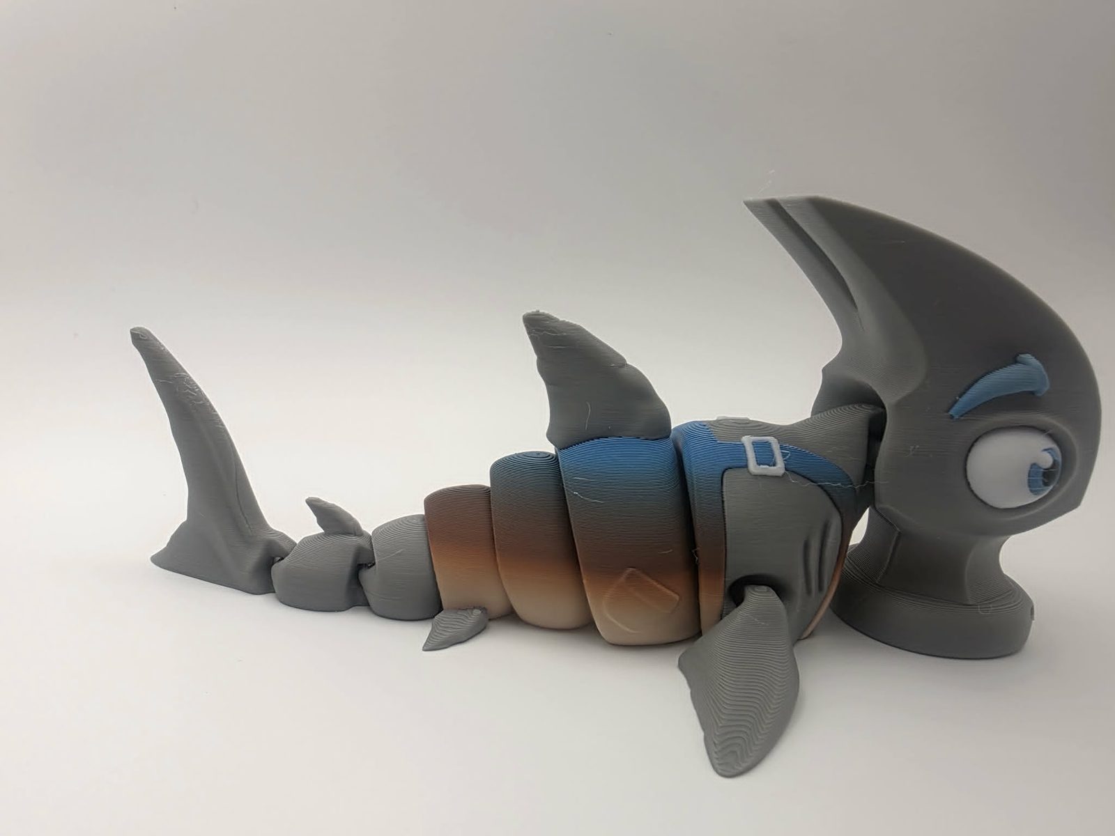 Cute Hammerhead Shark - Rusty Current - 6.5" Long x 4" Tip of Fin to Tip of Fin x 3" Tall - Gray, Cream, Brown, Blue, White, Black 3D printed item image