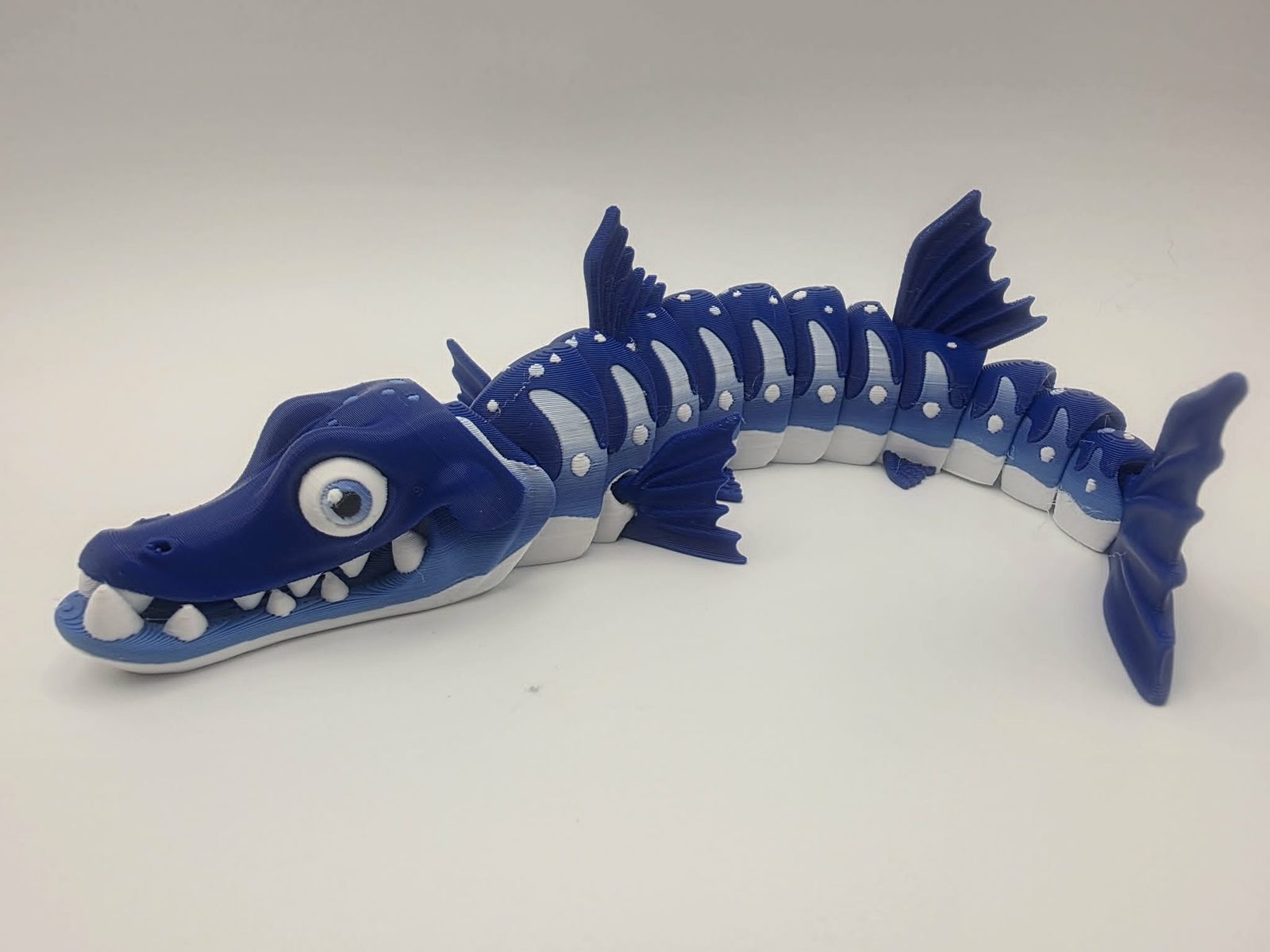 Barracuda - Bluewater - 8.5" Long x 2.25" Tip of Fin to Tip of Fin x 1.5" Tall - Blue and White, White, Blue, Black 3D printed item image