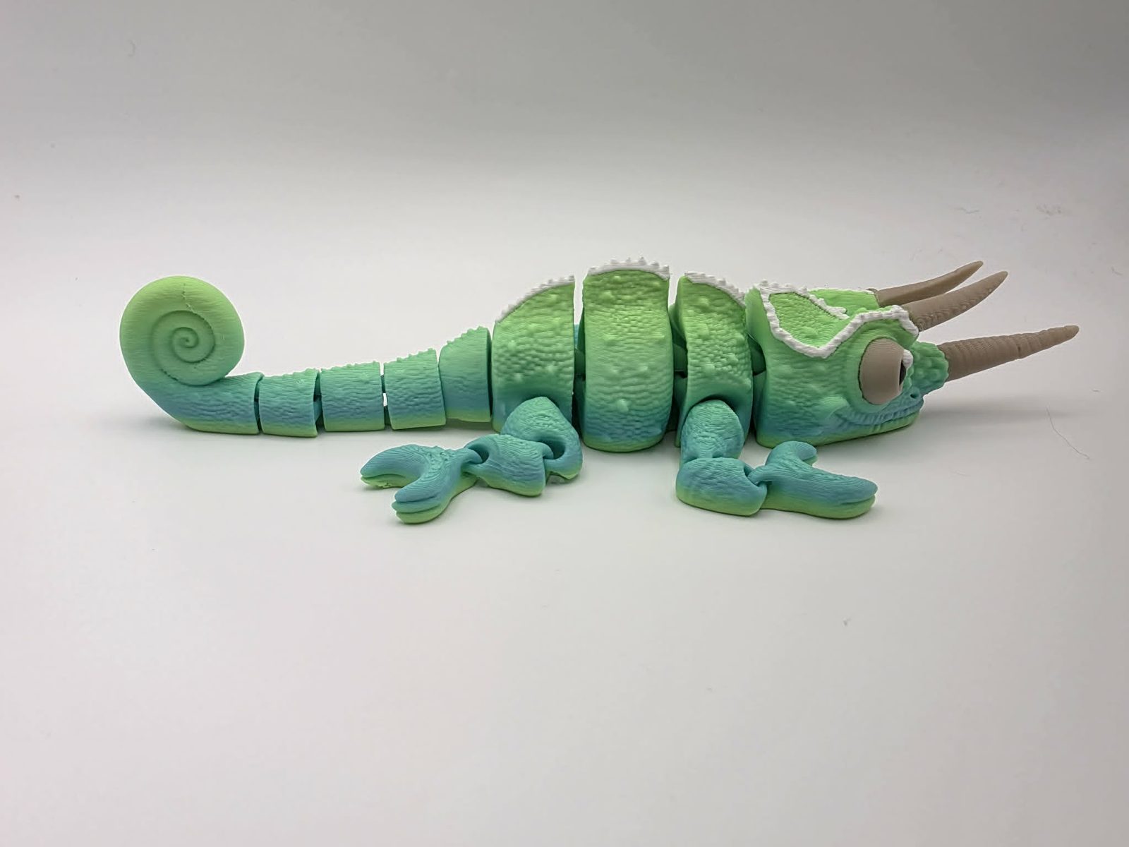 Chameleon - Citrus Splash - 7.5" Long x 3" Wide Elbow to Elbow x 1.5" Tall - Matte Yellow Green Rainbow, White, Bone White, Black 3D printed item image