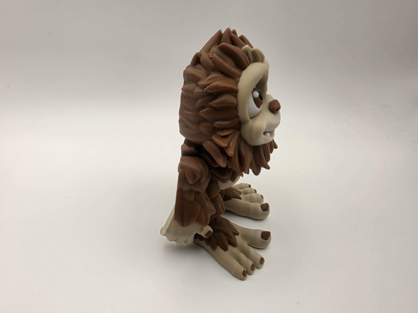 Bigfoot - Stomper - 3" Outer Arm to Outer Arm x 1.75" Tip of Toe to Heel x 4" Tall - Chocolate, Matte Light Brown, White, Black 3D printed item image