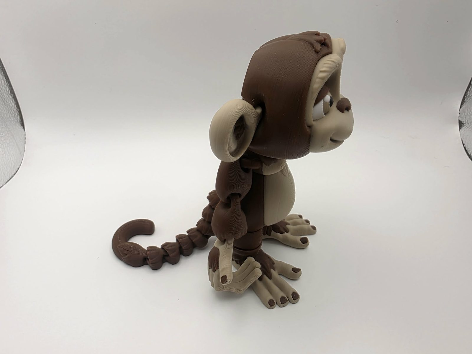 Monkey - Mischief Monkey - 5.5" from Tip of Toe to End of Tail x 4" Wide x 5.25" Tall - Coffee Brown, Matte Light Brown, White, Black 3D printed item image
