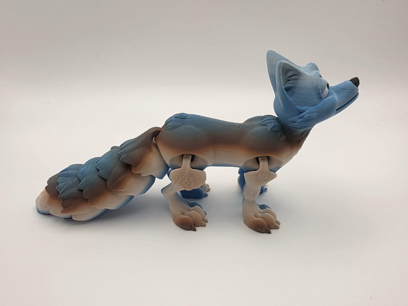 Fox - Curious Creek Fox - 6" Long x 1" Wide x 3" Tall - Cream, Brown, Blue, White, Black 3D printed item image
