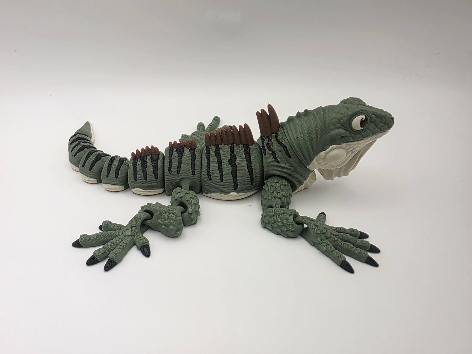 Iguana - Ridgeback - 8.5" Long x 3.5" Wide Elbow to Elbow x 2" Tall - Olive Green, Black, Bone White, Chocolate 3D printed item image